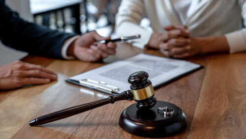 image of a person handing a pen to client with judge tools travelers rest sc